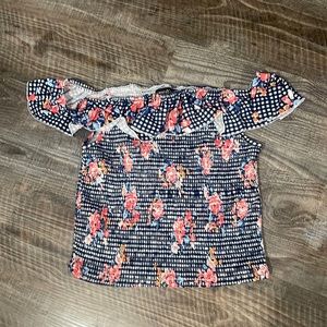 A multi color very stretchy top. Asking 10 dollars for it!